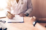 Doctor Writing Note