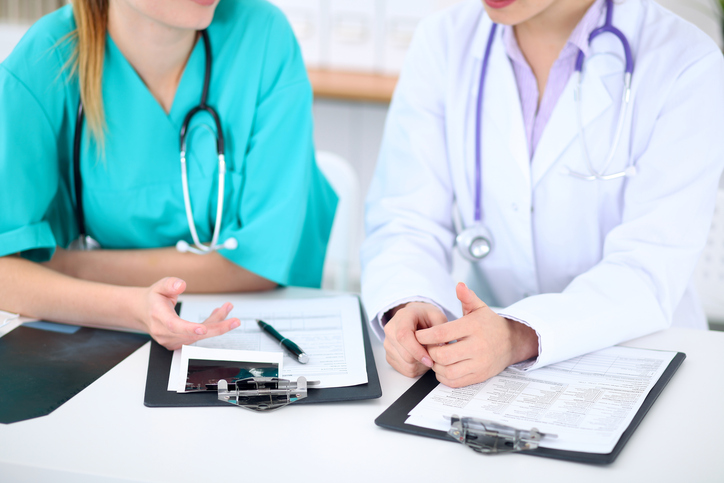 Picture showing two medical school students to depict studying medicine